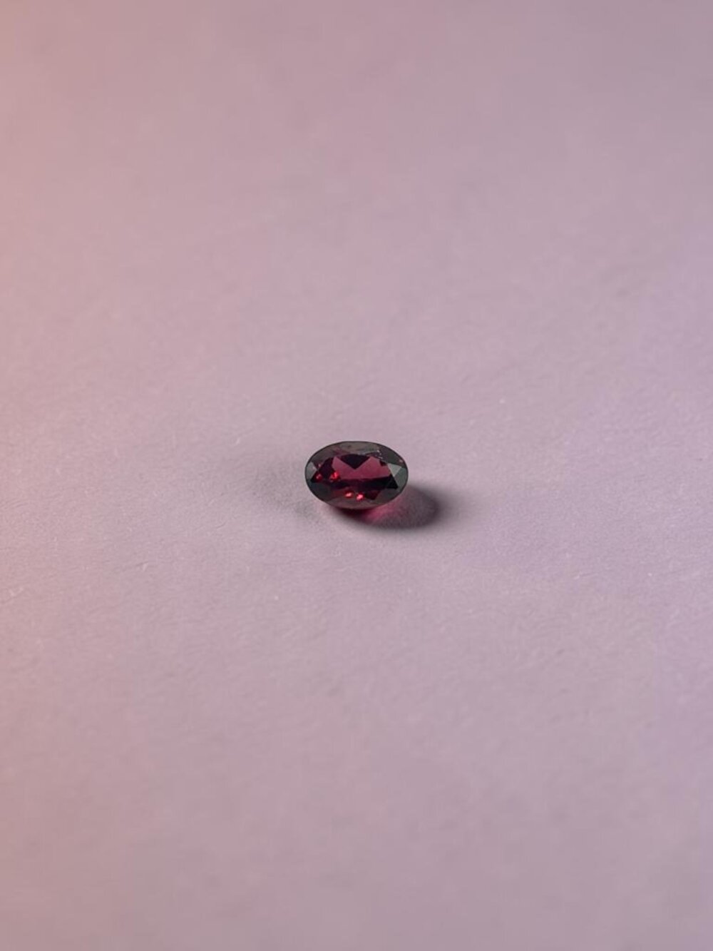 0.62 Carat Oval Rhodolite Garnet Gemstone - Live Show Listing